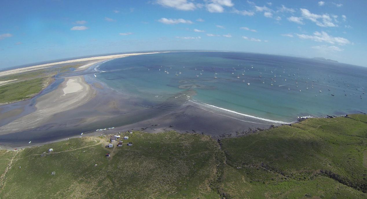 Aerial view of Bahía Santa María with the Ha-Ha fleet anchored off the sand spit
